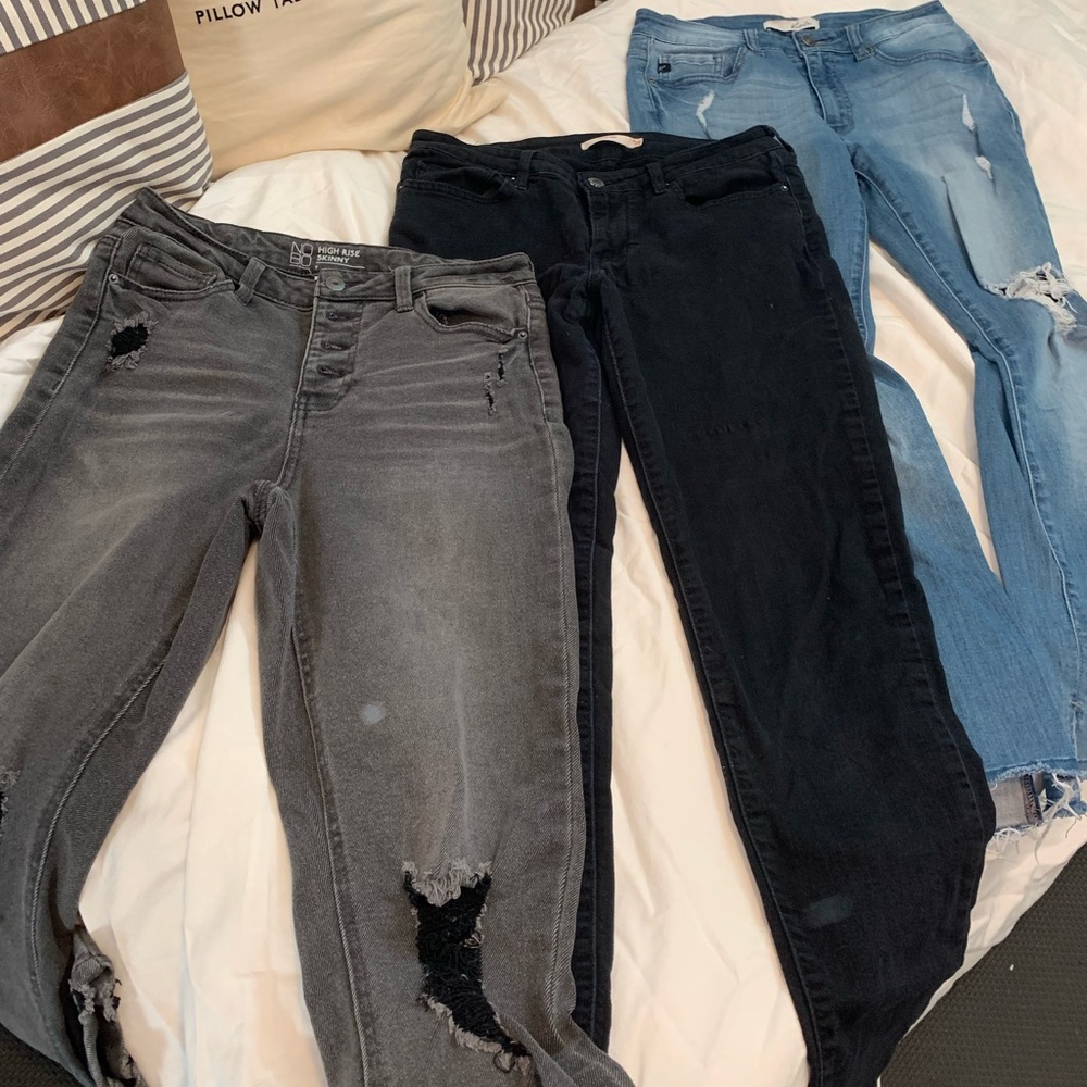 Three pairs of fashionable denim jeans. All very comfy and cute on!